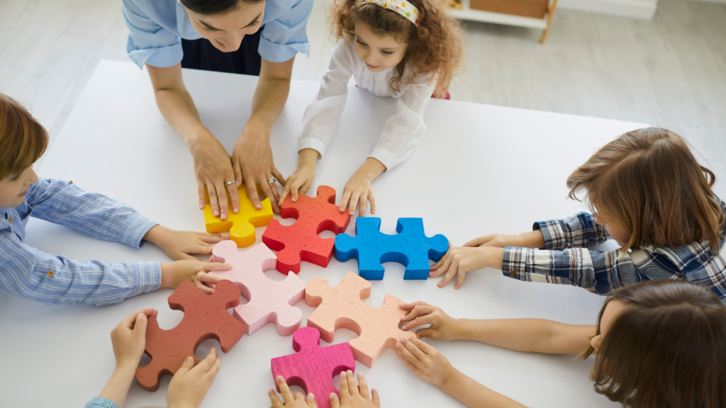 Kids in classroom  learning through games: puzzels
